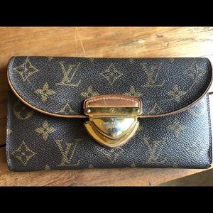 Authentic Louis Vuitton wallet w buckle clasp